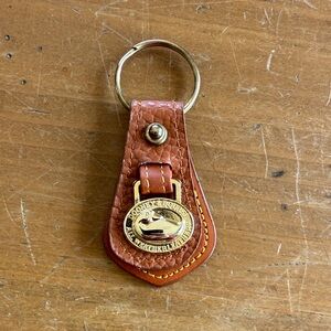 VNTG Dooney & Bourke Tan Leather Keychain with Gold Emblem